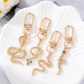 Gold Tone Sculpted Snake and Cobra Shape Clip Keychains view 1