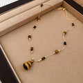 Gold Tone Brown Beaded Striped Gourd Pendant Necklace view 6