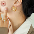 Twisted U-Shape Hoop Earrings Gold Steel Color Options view 3