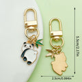 Panda Charm Keychains Featuring White Apple Across 54 Pictured Variations view 12