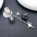 Black Polyhedral Dice and Four Point Star Clasp Keychain view 4