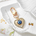 Rhinestone Blue Evil Eye Snap-Hook Keychains in Seven Shapes and Finishes view 2