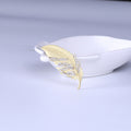 Matte Gold Long Feather Brooch With Three Curved Crystal Rows view 6