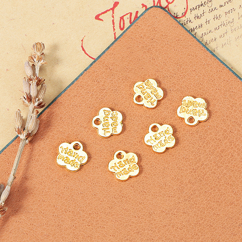 8mm Double-Sided Handmade Plum Blossom Alloy Charm