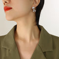 Fan Embossed Twist Stud Earrings Gold Steel Tone Pair view 6