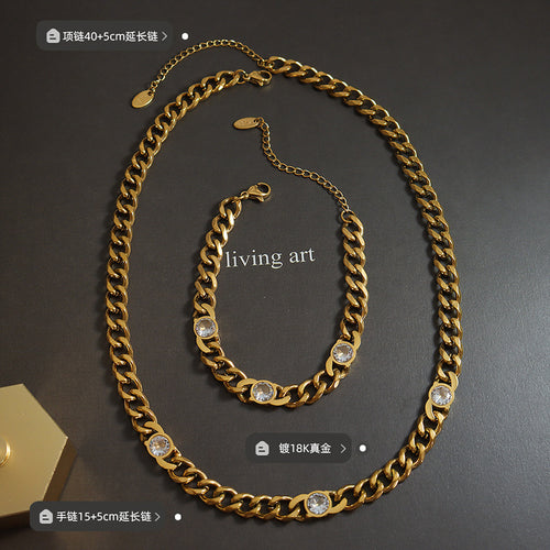Gold Cuban clear stone necklace and bracelet flat lay with length labels