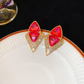 Pink Diamond Shape Crystal Stud Earrings with Gold Tone Frames view 4