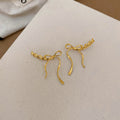 Bow Outline Drop Hook Earrings In Gold And Silver With Decorative Metal Details view 7