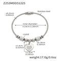 Heart Crystal and Geometric Bangle Collection in Two Metal Tones view 9
