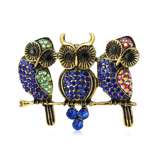 Three Owl brooch shown in front product view
