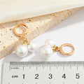Gold Tone Double Faux Pearl Huggie Drop Earrings in Graduated Sizes view 2