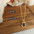 Gold Oval Black Stone Pendant Necklace Geometric Frame view 2