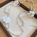Long Pearl Bead Necklace with White Fabric Flowers view 4