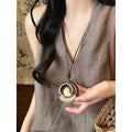 Long Cord Pendant Necklace in Four Wood and Metal Designs view 4