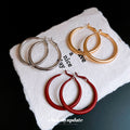 Rounded Hoop Clip Earrings in Gold and Silver Tone view 2