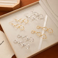 Gold and Silver Spiral Ribbon Hook and Huggie Earrings view 2