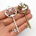 Large Ornate Skeleton Key Charms in Two Antique Finishes view 1