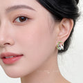 Gold Tone Green Leaf White Cat And Orchid Scene Stud Earrings view 2