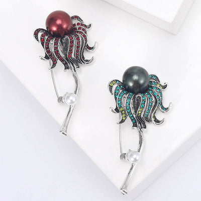 Jellyfish Brooch with Faux Pearl Head displayed from the front