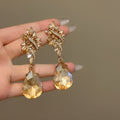 Floral Cluster Teardrop Earrings in Silver and Gold Tone view 2