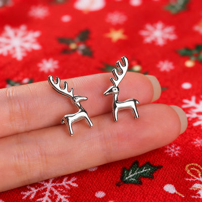 Image 5 showing reindeer silhouette stud earrings