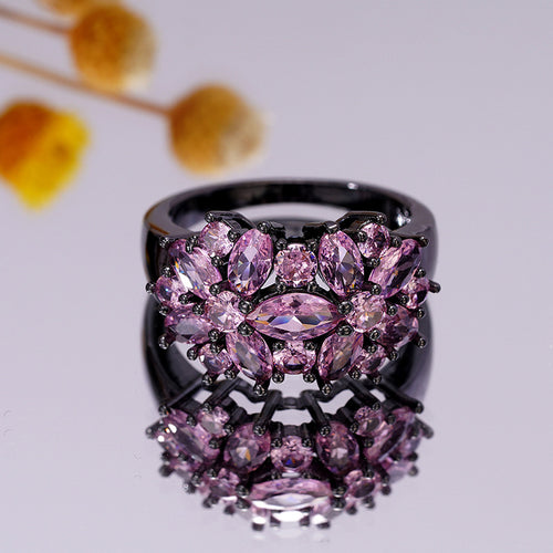 Second product view showing dark metal-tone purple marquise floral cluster ring