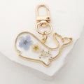 Gold Tone Pressed Flower Whale Resin Clip Keychains in Eight Designs view 7