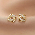 Gold Tone Knot Stud Earrings with Clear Stones Polished Metal Jewelry view 2
