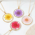 Gold Tone Round Clear Resin Dried Flower Pendant Necklaces in Four Colors view 1