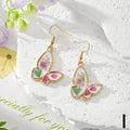 Gold Tone Pressed Flower Butterfly Drop Earrings in Twelve Designs view 12