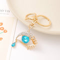 Blue Rhinestone Eye Tear Keychain Gold Tone Metal Hardware view 1