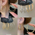 Double Layer Textured Hoop Earrings in Gold with Polished Details view 1