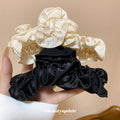 Black Ruffled Fabric Claw Hair Clip With Pearl Accent view 2