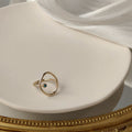 Gold Open Geometric Oval Ring With Tiny Teal Stone view 3