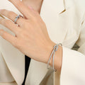 Double Wire Knot Open Cuff Bangle And Matching Knot Ring view 6