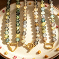Mixed Twelve Millimeter Flat Bead Necklaces With Three Clasps view 2