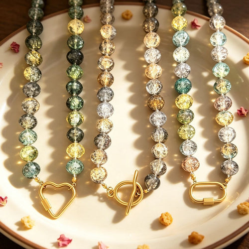 Alternate view showing the shape and hardware of the pictured flat bead necklaces