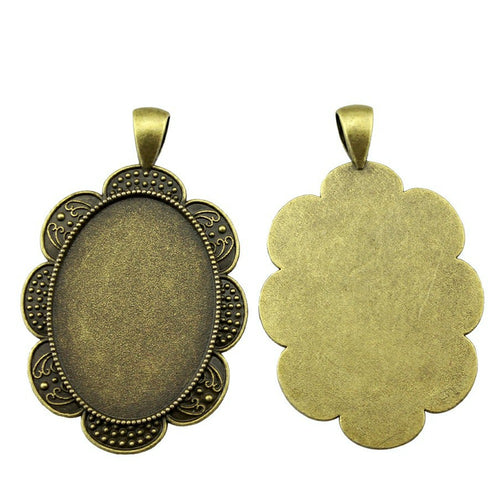 Scalloped oval pendant setting front and back views on a white background