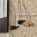 Light Brown Wood Gourd Pendant Necklace on Adjustable Black Cord view 4