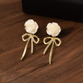 White Rose and Clear Stone Gold Tone Bow Dangle Earrings view 4