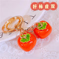 Persimmon and Orange Fortune Charm Keychains in Eighteen Pictured Designs view 6