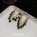 Black Teardrop Beaded Chandelier Earrings in Two Metal Tones view 3