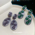Pair of Metal Tone Purple and Green Crystal Oval Drop Earrings view 4