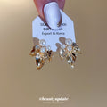 Gold Tone Leaf Stud Earrings with Pearl Accents Jewelry Design view 2