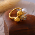 Twisted Band Multi-Sphere Pearl Pavé Gold Steel Rings view 2
