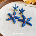Blue Starfish Stud Earrings with Red Crystal Details view 3