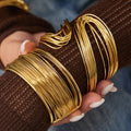 Layered Wire Cuff Bracelets in Gold and Silver Tone view 2