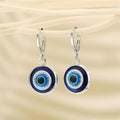 Silver Tone Round Glass Blue Evil Eye Huggie Drop Earrings view 3