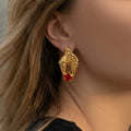 Textured Shell Earrings with Red Square Crystals in Gold Tone view 3
