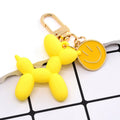Gold Tone Balloon Dog and Smile Disc Clip Keychains view 8